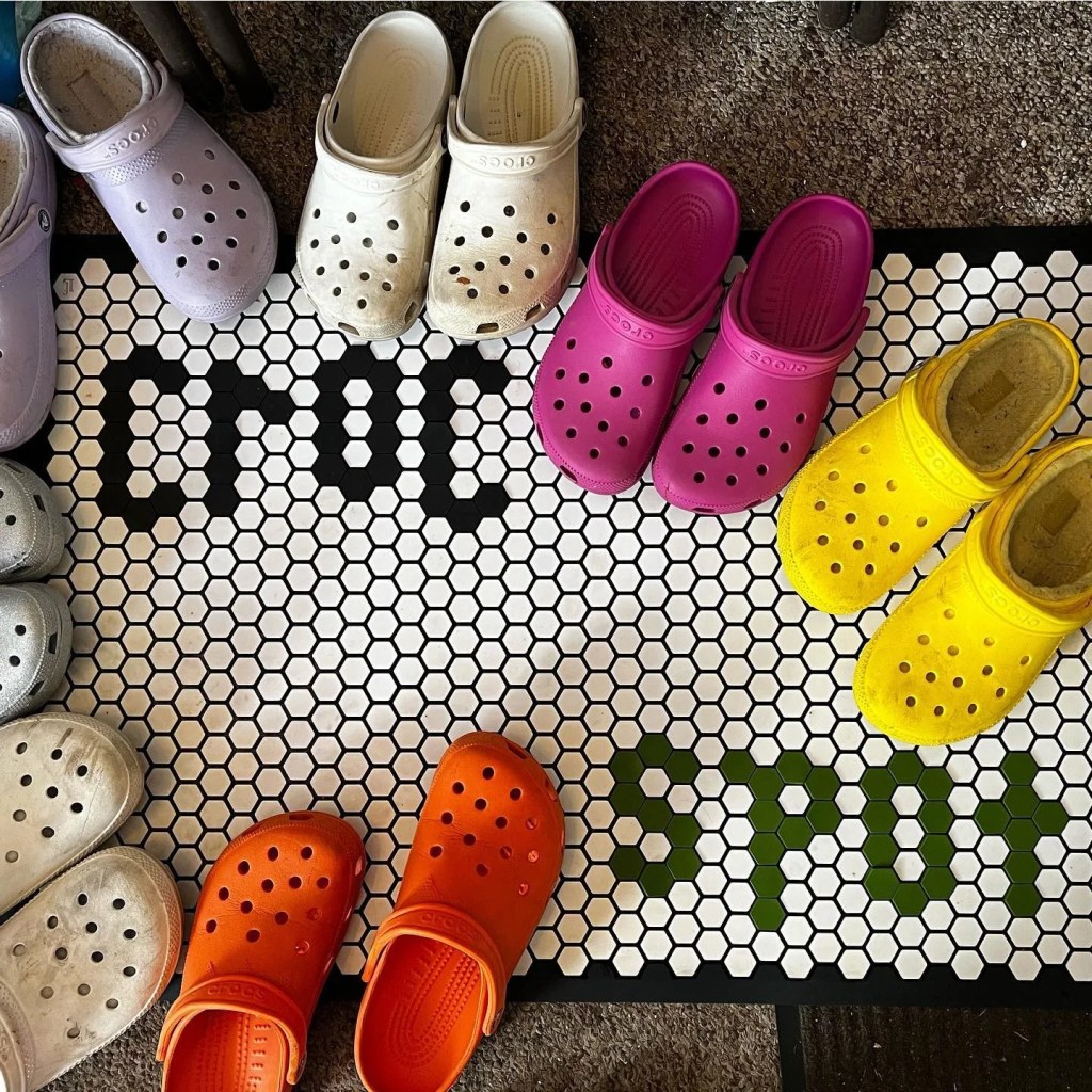 Croc shoes on a tile floor